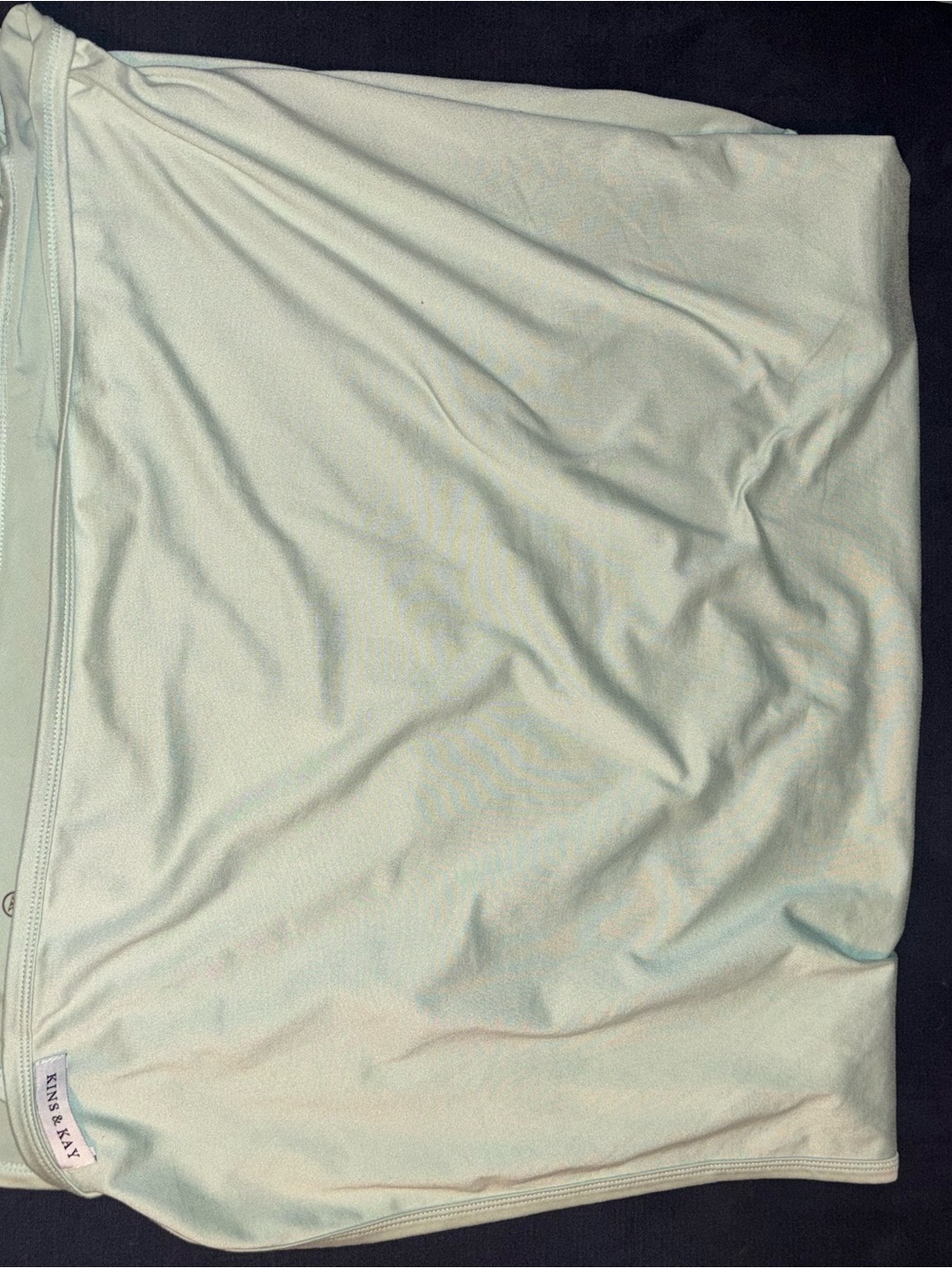 Kins & Kay swaddle blanket sage green